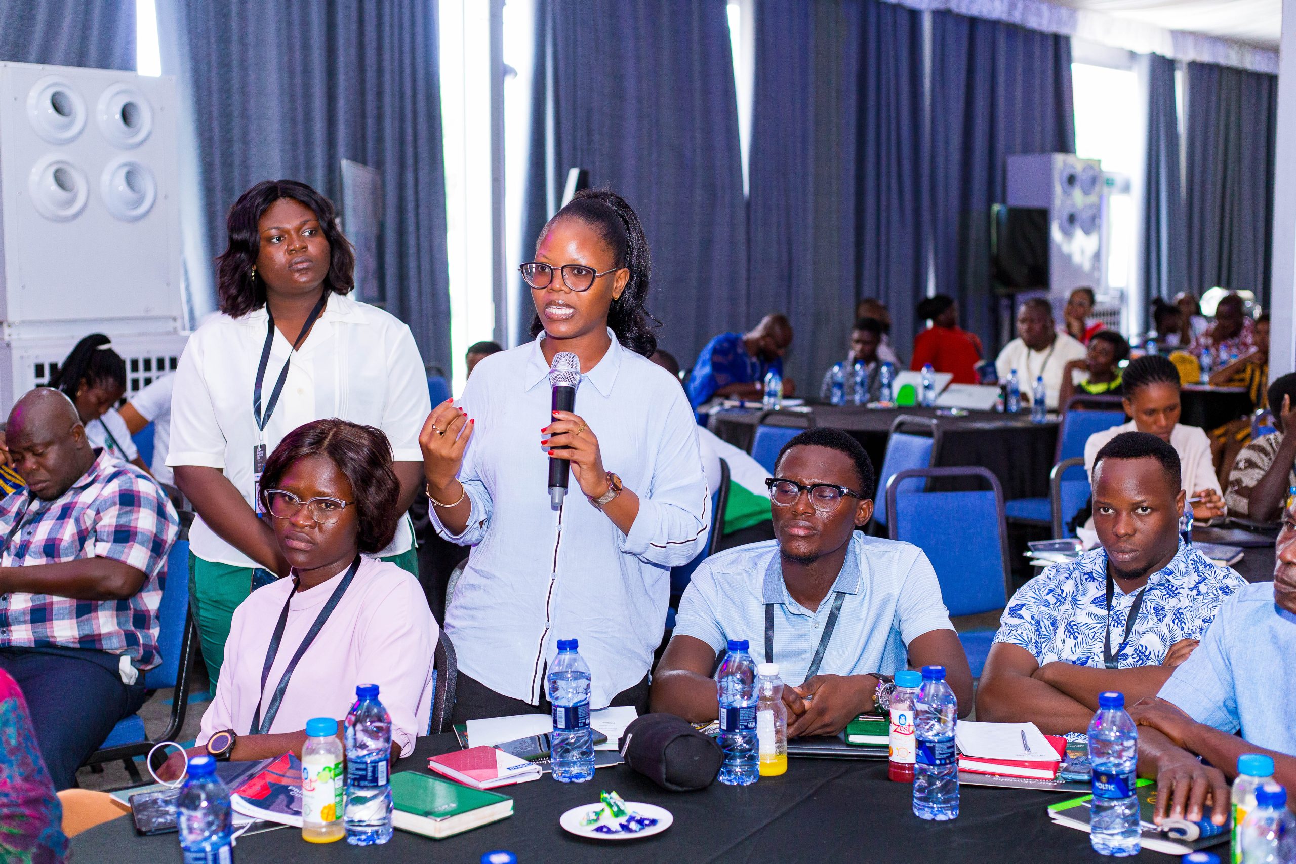 Conference guests wearing printed name tags