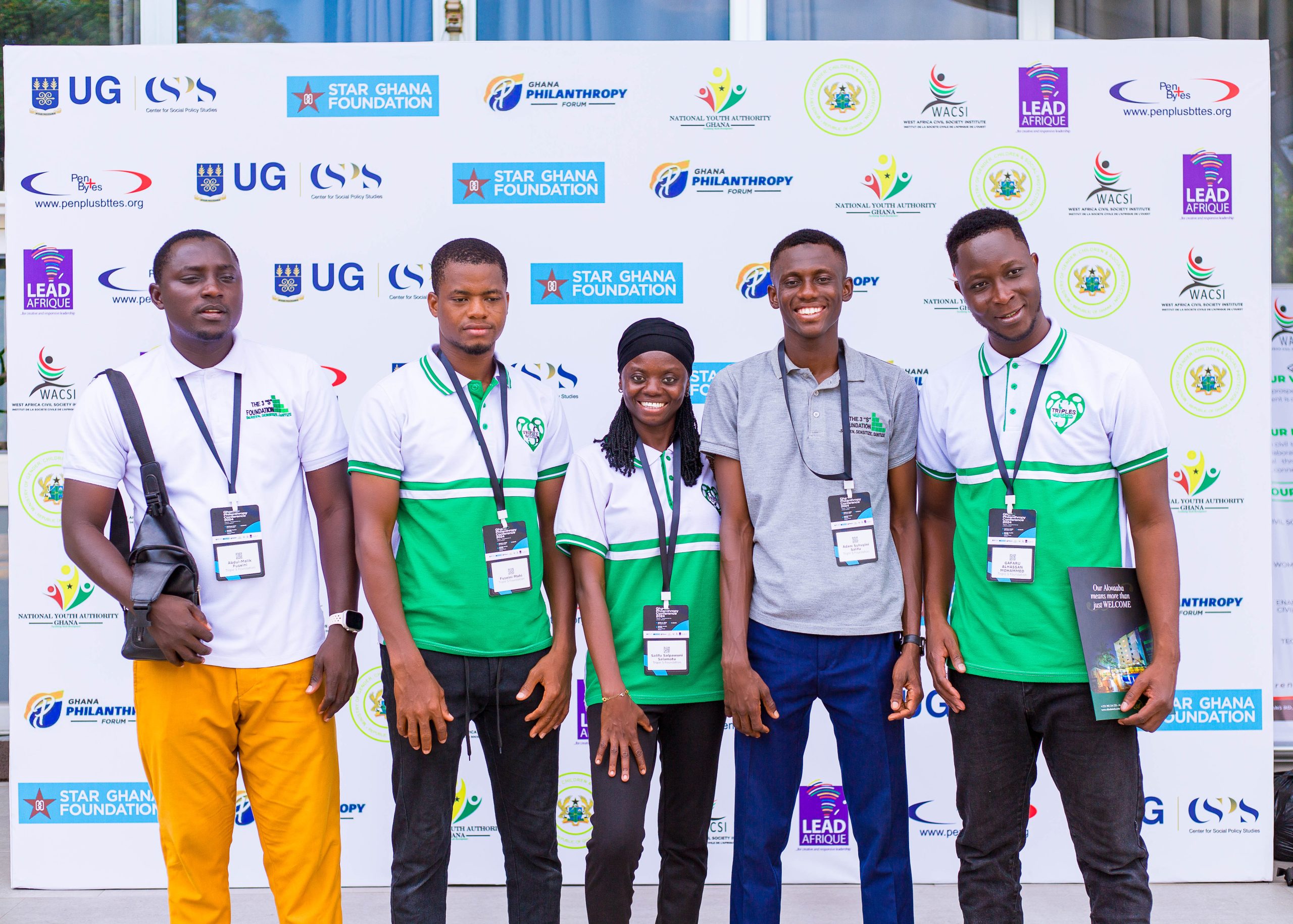 Guests wearing Ayalogbook name tags at an event in Ghana